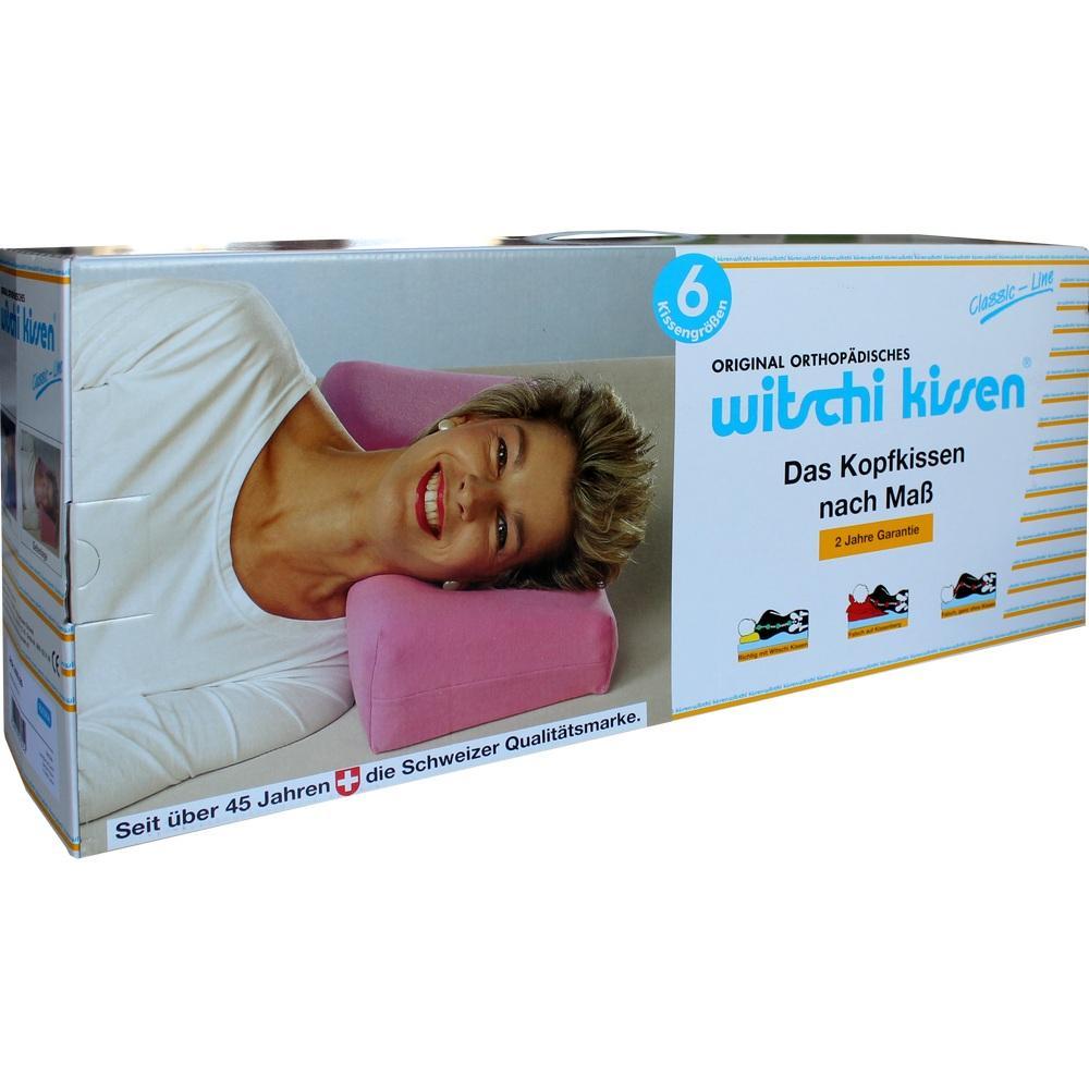 Ein rosa Kissen mit einer lächelnden Person darauf ist auf der Verpackung abgebildet.